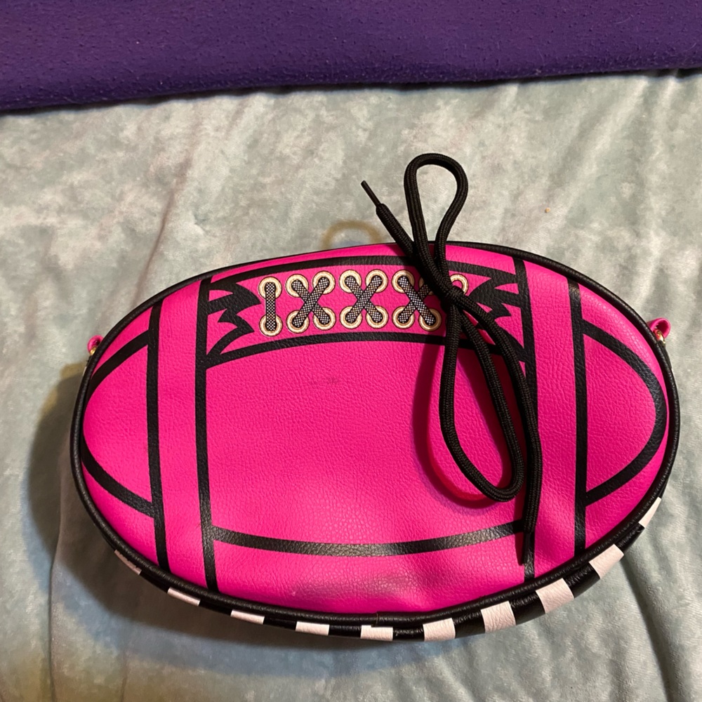 Bright pink football Betsey Johnson purse